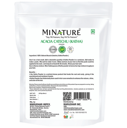Minature Acacia Catechu (Katha) powder for hair masks, finely ground herbal powder in a clear container with a white background.