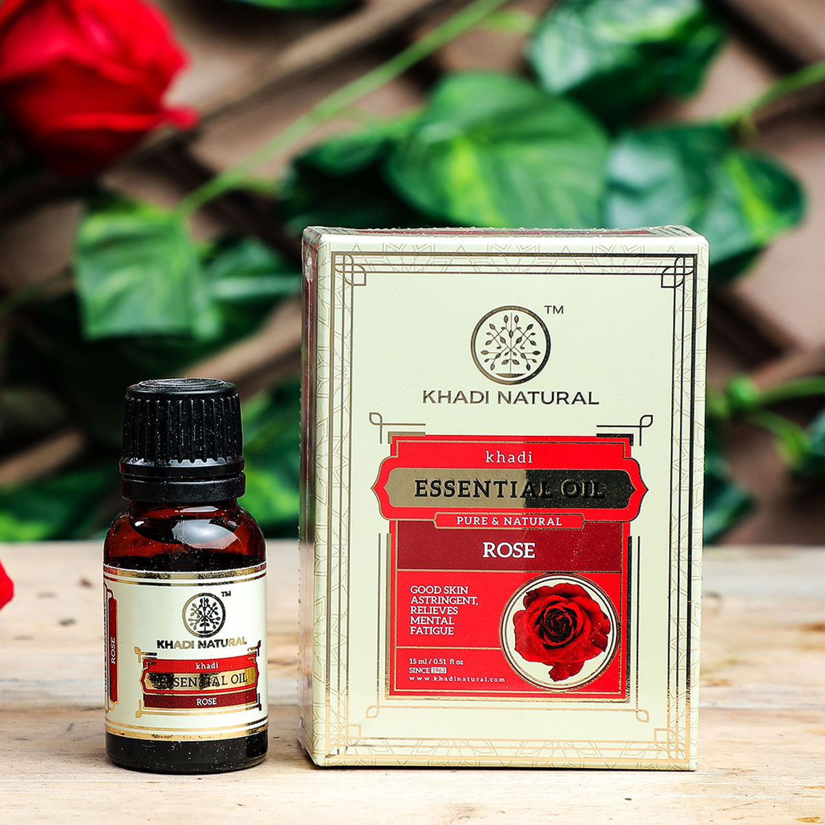 Khadi Natural Rose Essential Oil bottle with dropper, showcasing natural rose oil for balance and calming benefits.