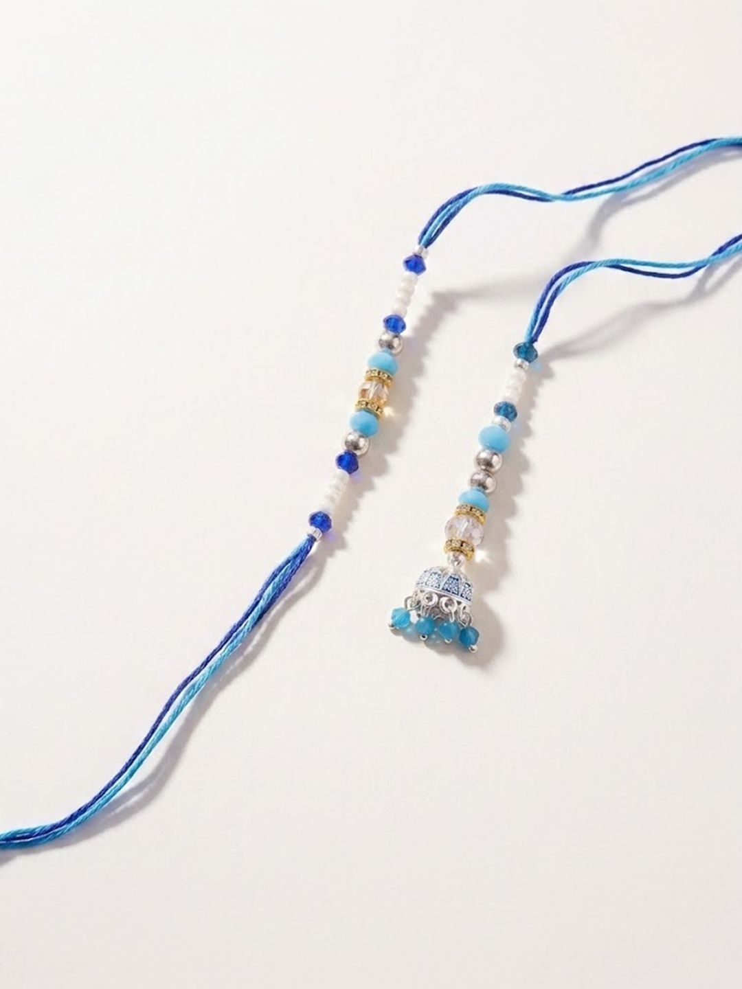 Anouk Set Of 2 Blue Artificial Beads Jhumka Design Bhaiya Bhabhi Rakhi With Roli Chawal
