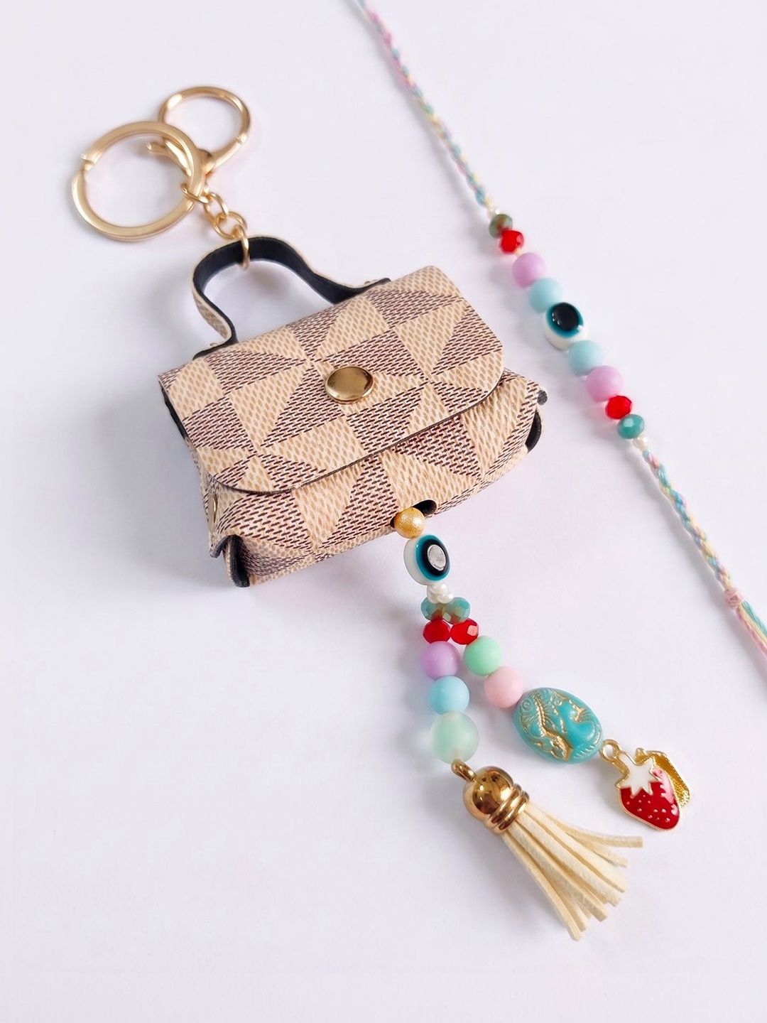 Anouk Set Of 2 Purse Design Evil Eye & Beads Bhaiya Bhabhi Rakhi With Roli Chawal