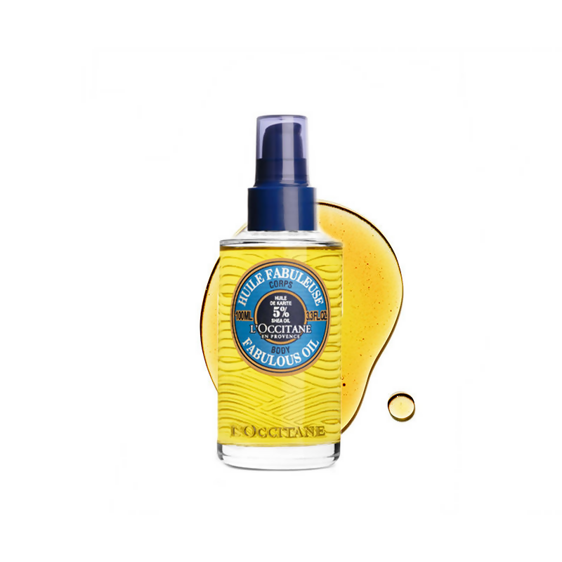 L'Occitane Shea Butter Fabulous Oil for face, featuring a clear glass bottle with a pump dispenser and golden oil inside.