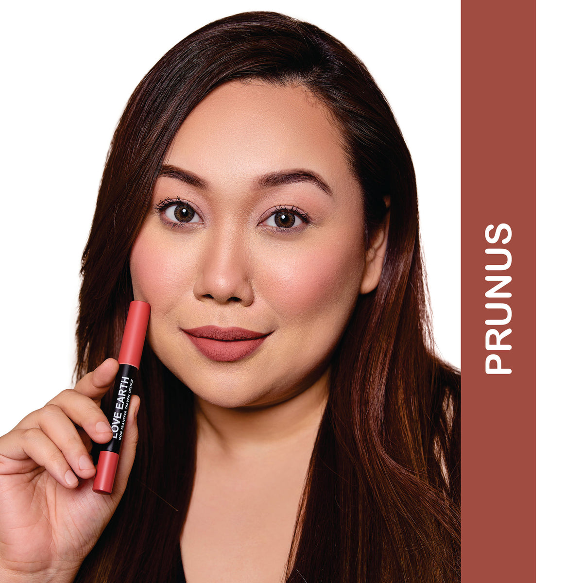 Love Earth Prunus non-transfer crayon lipstick in a sleek tube, featuring a vibrant pink shade for bold lip color.