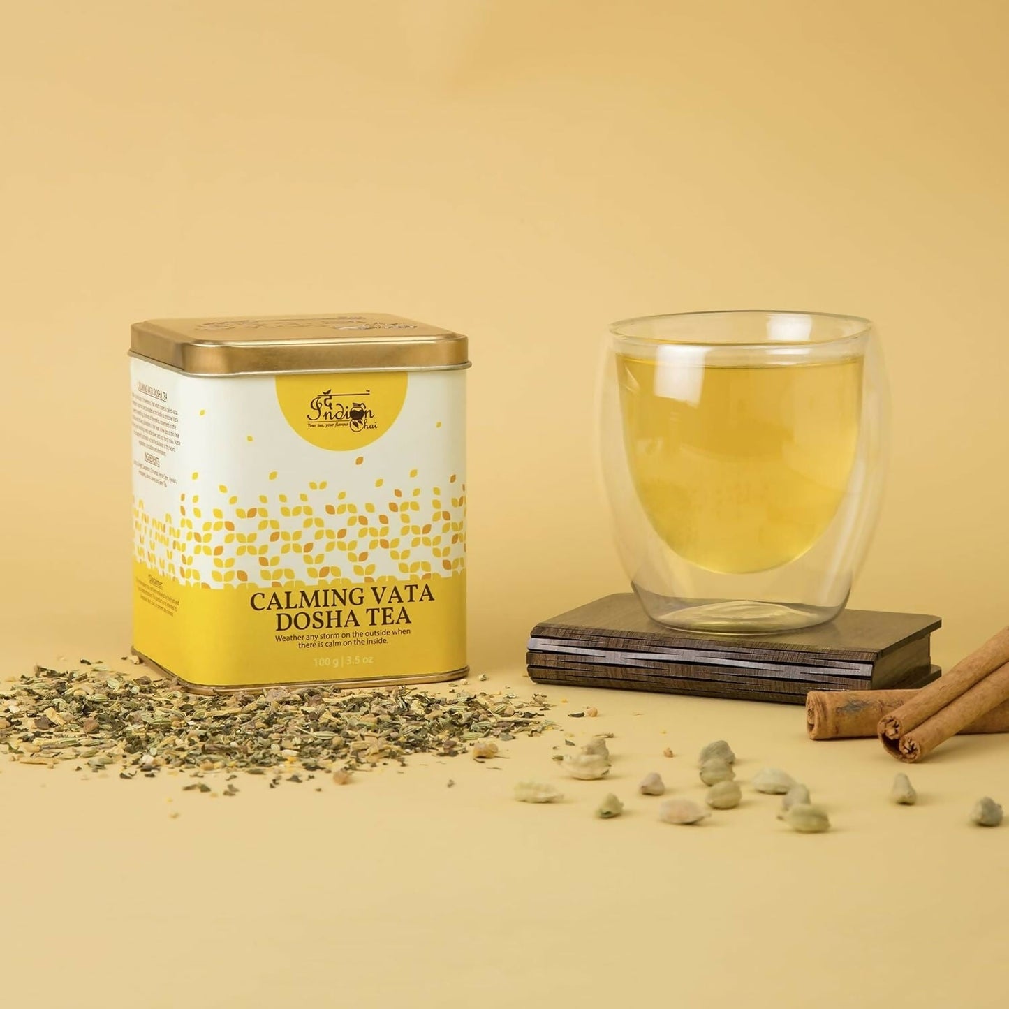 Indian Chai calming Vata Dosha tea powder in a traditional container, showcasing its warm, aromatic blend for balancing Vata.