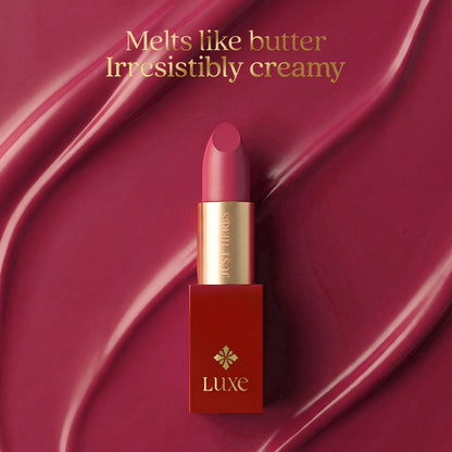 Just Herbs Luxe Satin Melt High Shine Lipstick in shade 06 Berry Allure, showcasing a smooth, shiny berry-colored lipstick on a neutral background.