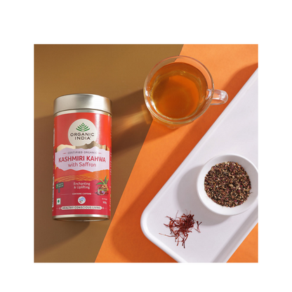 Organic India Kashmiri Kahwa herbal tea with saffron in a traditional tea cup, showcasing the aromatic tea blend.