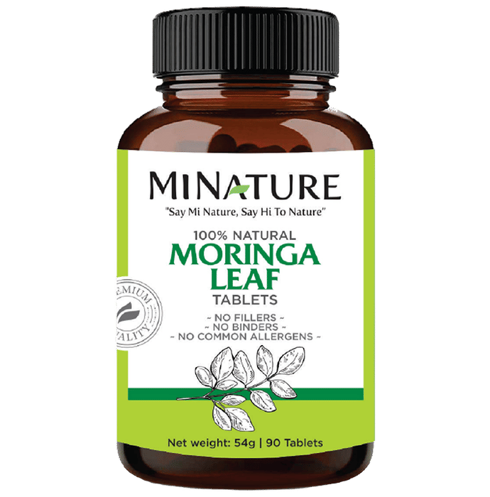 Minature Ayurvedic Moringa Leaf Tablets, 100% natural miniature supplement for health and wellness, shown in a clear blister pack.