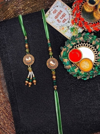 Anouk Set Of 2 Ad Drawstring Bhaiya Bhabhi Rakhi With Roli Chawal Chandan Mishri
