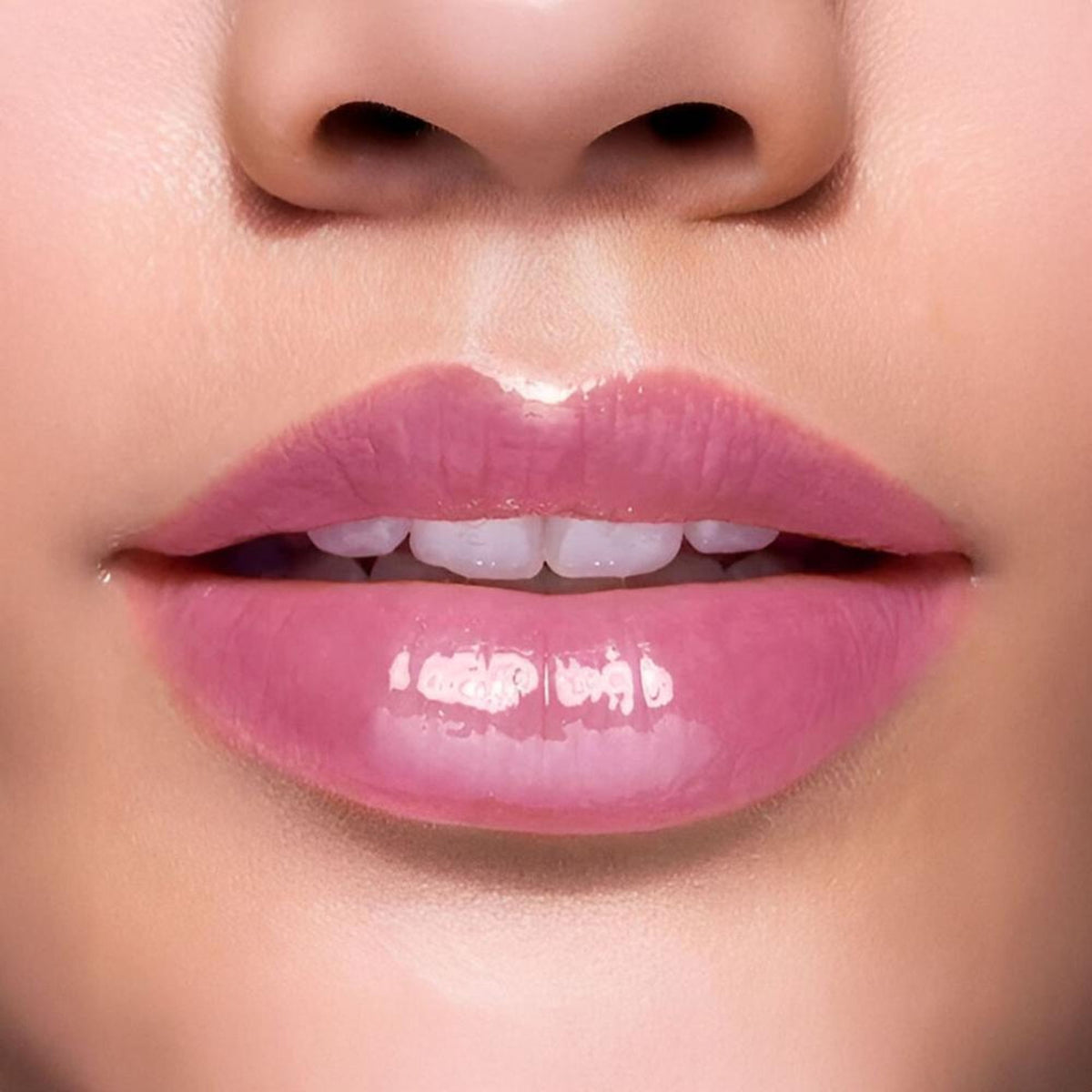 BLUR It's Giving Honey Lip Oil in Grape flavor, featuring a sleek tube with a clear cap and vibrant purple accents.