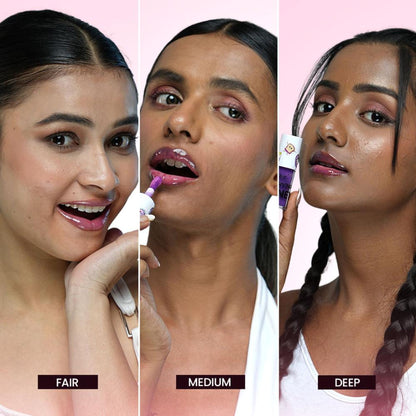 BLUR It's Giving Honey Lip Oil in Grape flavor, featuring a sleek transparent bottle with a golden cap and purple grape accents.