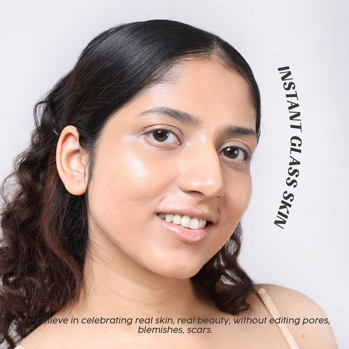 House of Makeup Face Anything Luminous Skin Tint in Light Skin Tone, showcasing a smooth, glowing glass skin finish on a model's face.