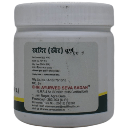 Seva Sadan Ayurvedic Khadir Churna in a glass jar, showcasing the herbal powder used for traditional health remedies.