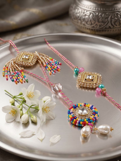 Anouk Set Of 2 White Artificial Stones Golden Toned Bhaiya Bhabhi Rakhi With Roli Chawal