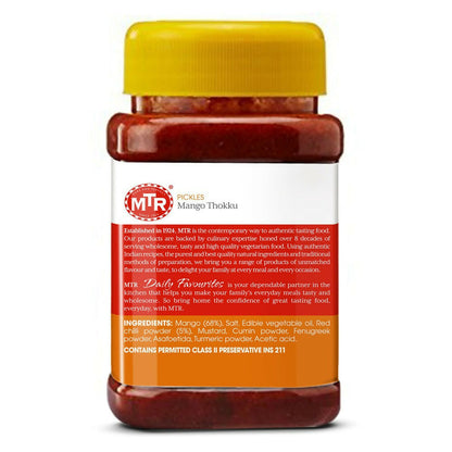 MTR Mango Thokku Pickle in a jar, North Indian style, with vibrant mango pieces and spices visible.