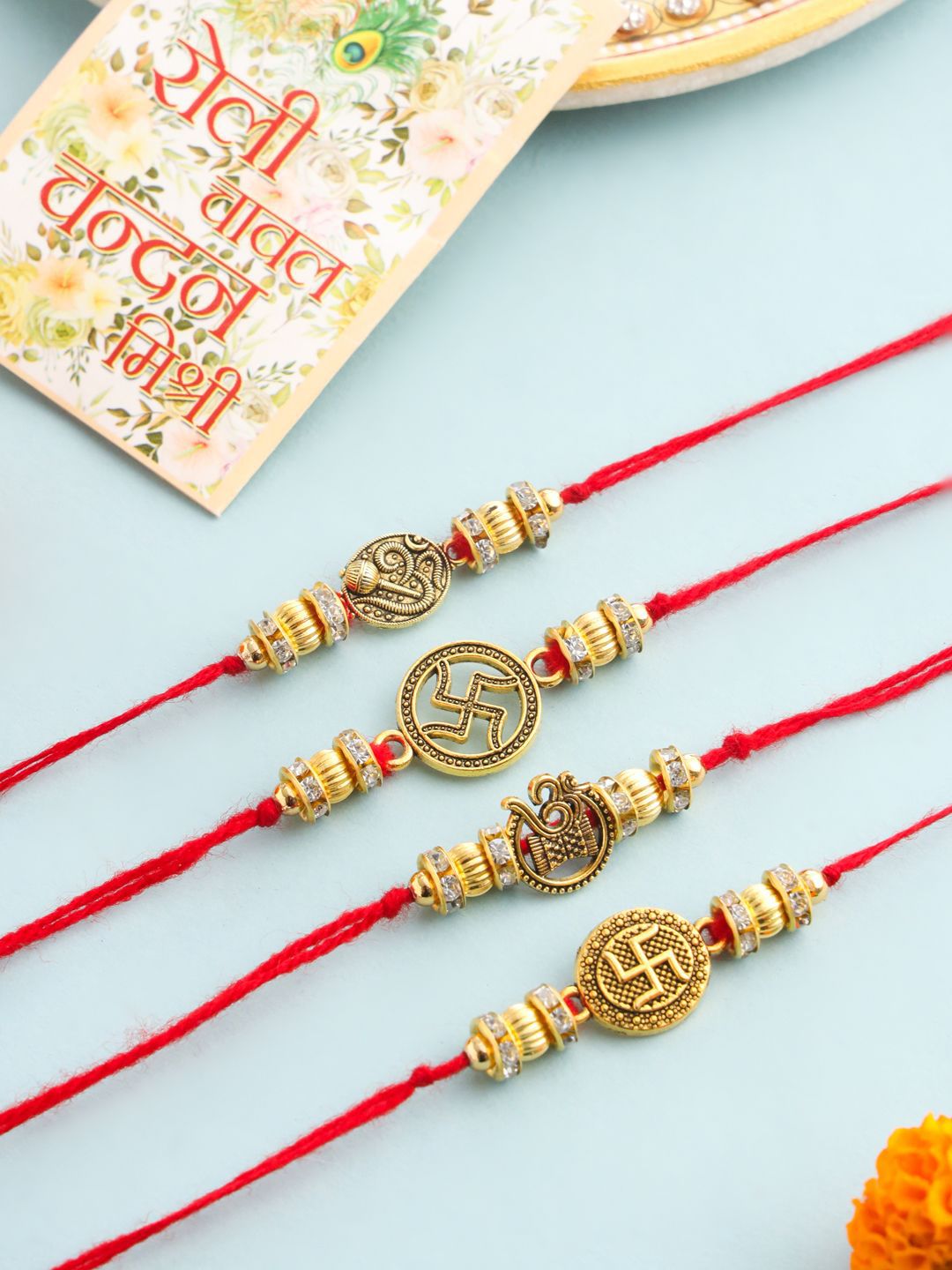 Anouk Set Of 4 Artificial Stones Studded & Beaded Swastik Thread Rakhis