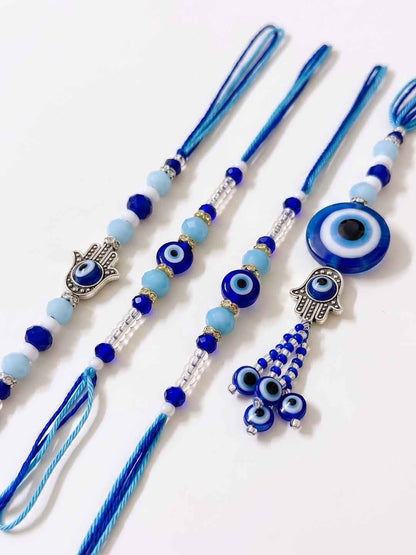 Anouk Set Of 4 Designer Blue Evil Eye Thread Rakhi With Roli Chawal Chandan Mishri