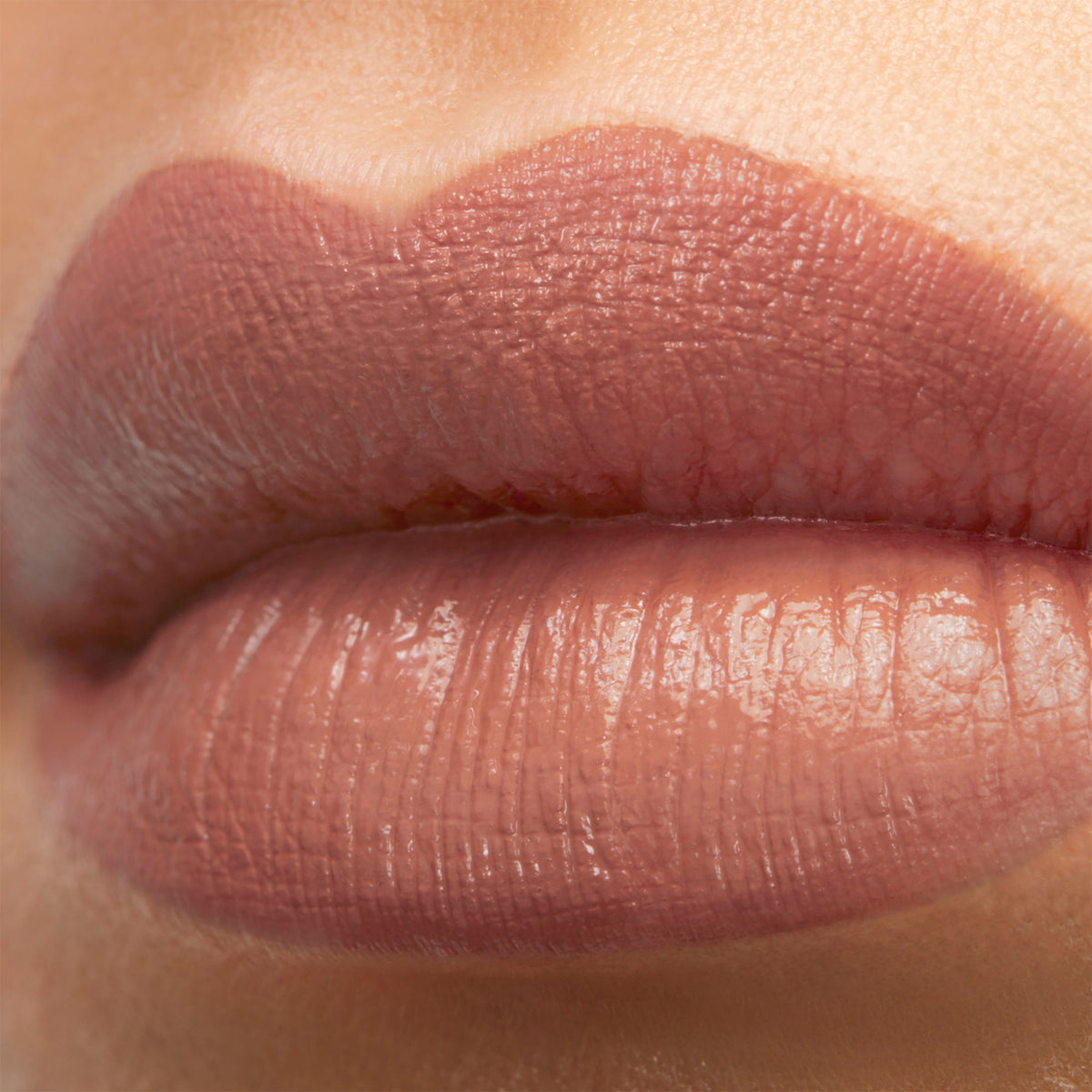 Yves Saint Laurent Rouge Pur Couture lipstick in N1 Beige Trench with satin finish, showcasing the elegant lipstick bullet.
