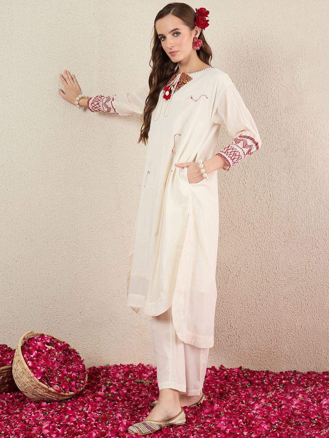 Women Ethnic Motifs Embroidered Cotton Kurta with Trousers
