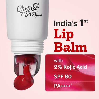 Chemist at Play Cherry tinted lip balm with SPF 50 PA++++ for dry, chapped, and pigmented lips, showing the balm and packaging.