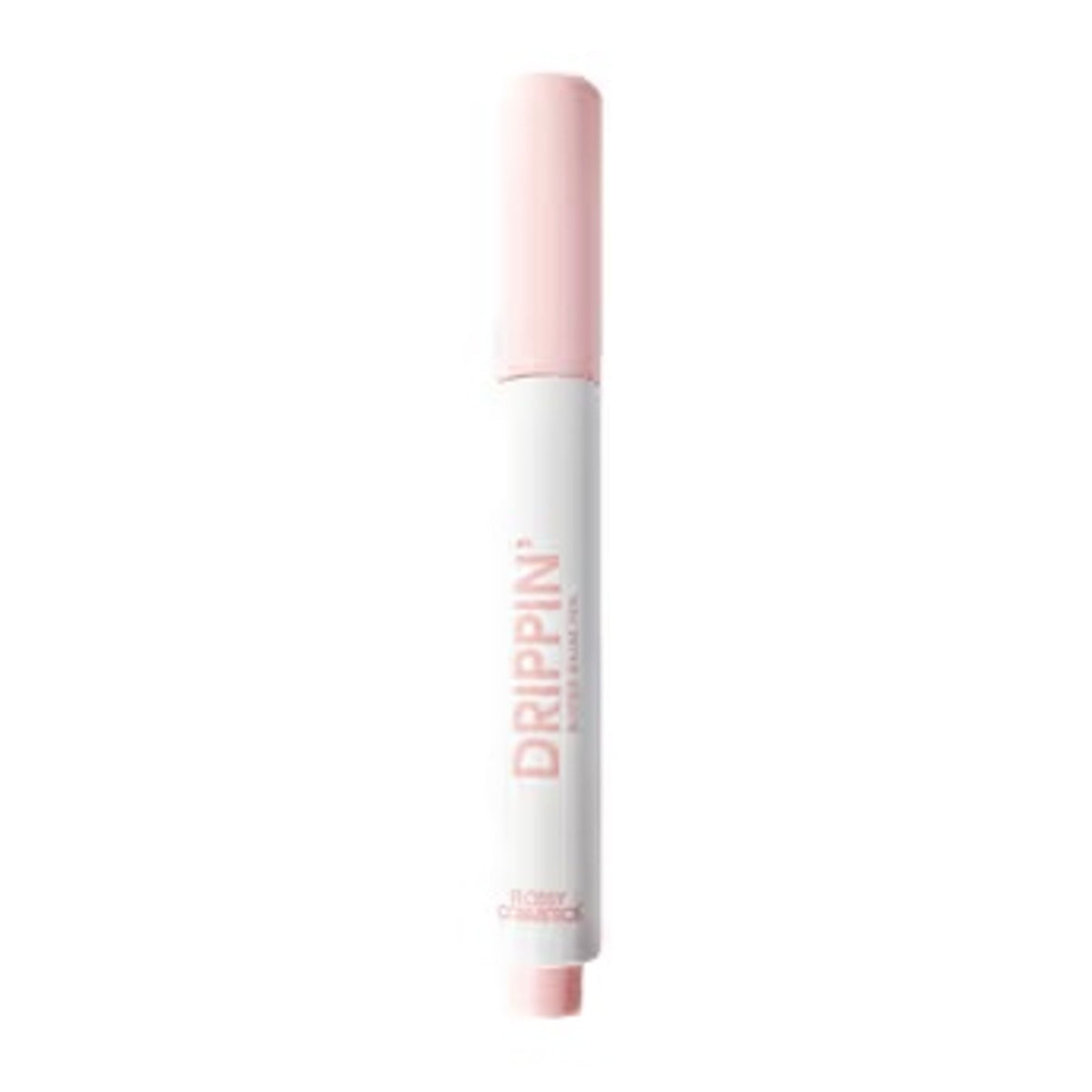 Flossy Cosmetics tinted lip balm with Shea butter and Jojoba oil, featuring a Jamun shade, moisturizing and brightening dry lips.