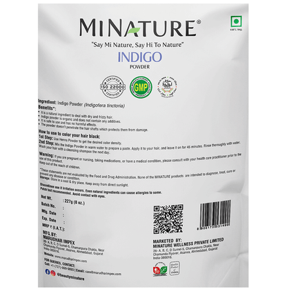 Minature Indigo Organic Powder for hair masks, showing a close-up of the vibrant blue powder in a container.