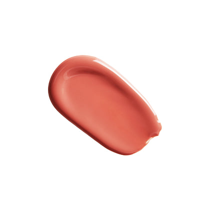 Kylie Cosmetics Supple Kiss Lip Glaze in All Yours, a glossy lip gloss with a smooth, shiny finish, displayed on a neutral background.