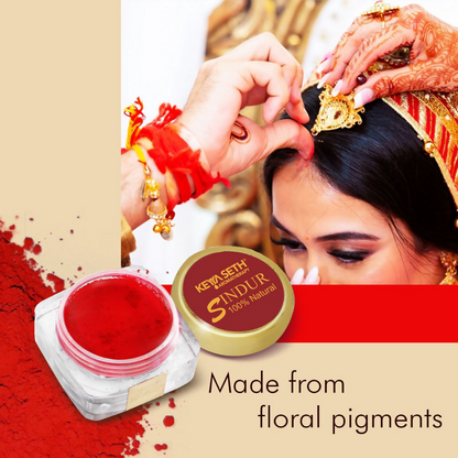 Keya Seth Aromatherapy Red Sindoor powder in a small container, natural makeup product used for traditional Indian adornment.