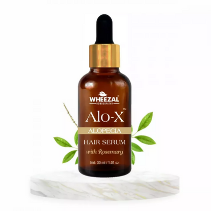 Wheezal Alo-X Alopecia Hair Serum bottle with applicator, designed to promote hair growth and reduce hair loss.