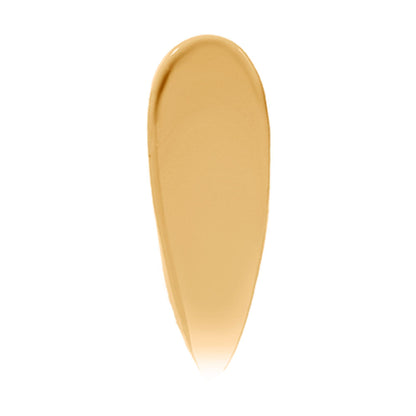Bobbi Brown Vitamin Enriched Skin Tint in Medium 2, lightweight foundation with a natural finish, visible on model's face.