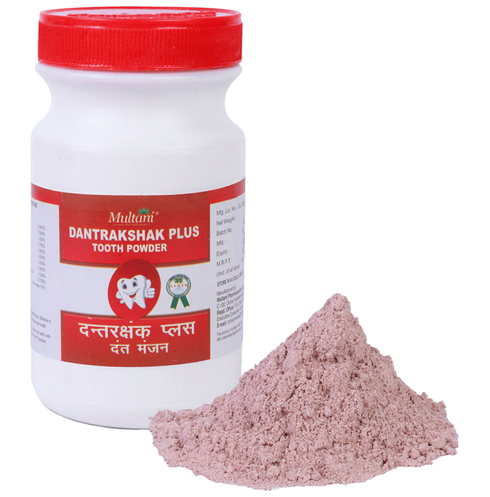 Multani Dantrakshak Plus Ayurvedic Tooth Powder in a jar, showcasing natural herbal ingredients and traditional packaging.