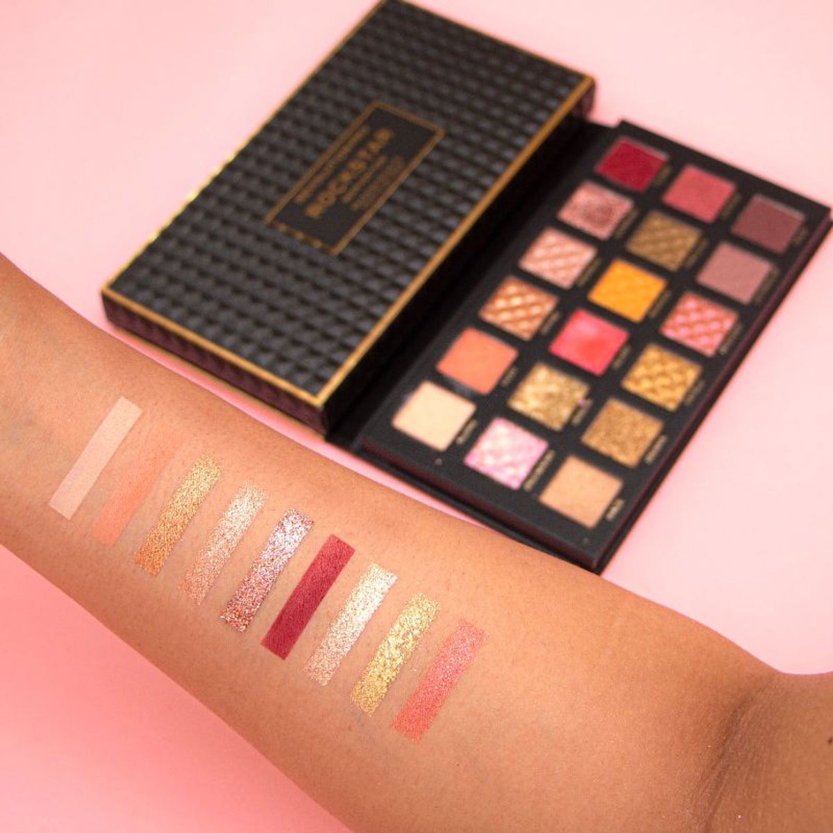 Revolution Pro Rockstar Shadow Palette Noir Edition with multiple dark and smoky eyeshadows in a sleek palette.