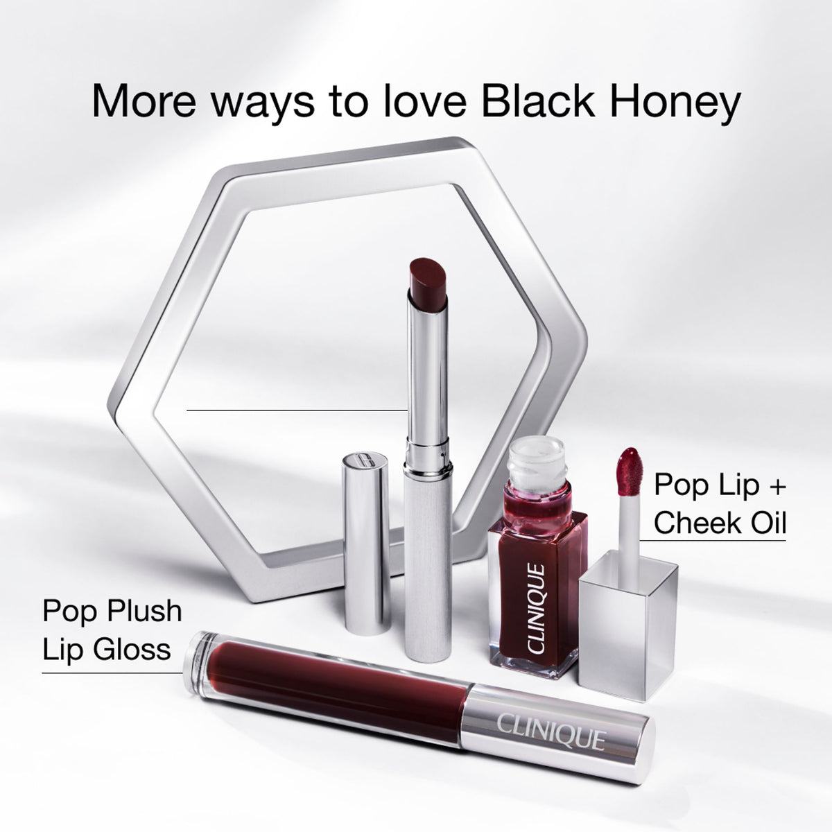 Clinique Pop Plush Creamy Lip Gloss in Black Honey with smooth, shiny finish and applicator wand visible in the image.