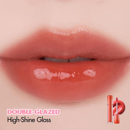 Rom&nd The Juicy Lasting Tint in Pink Pumpkin, showing the vibrant pink lip tint in a sleek tube with a wand applicator.
