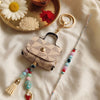 Dhiyona Set Of 2 Purse Design Evil Eye & Beads Bhaiya Bhabhi Rakhi With Roli Chawal