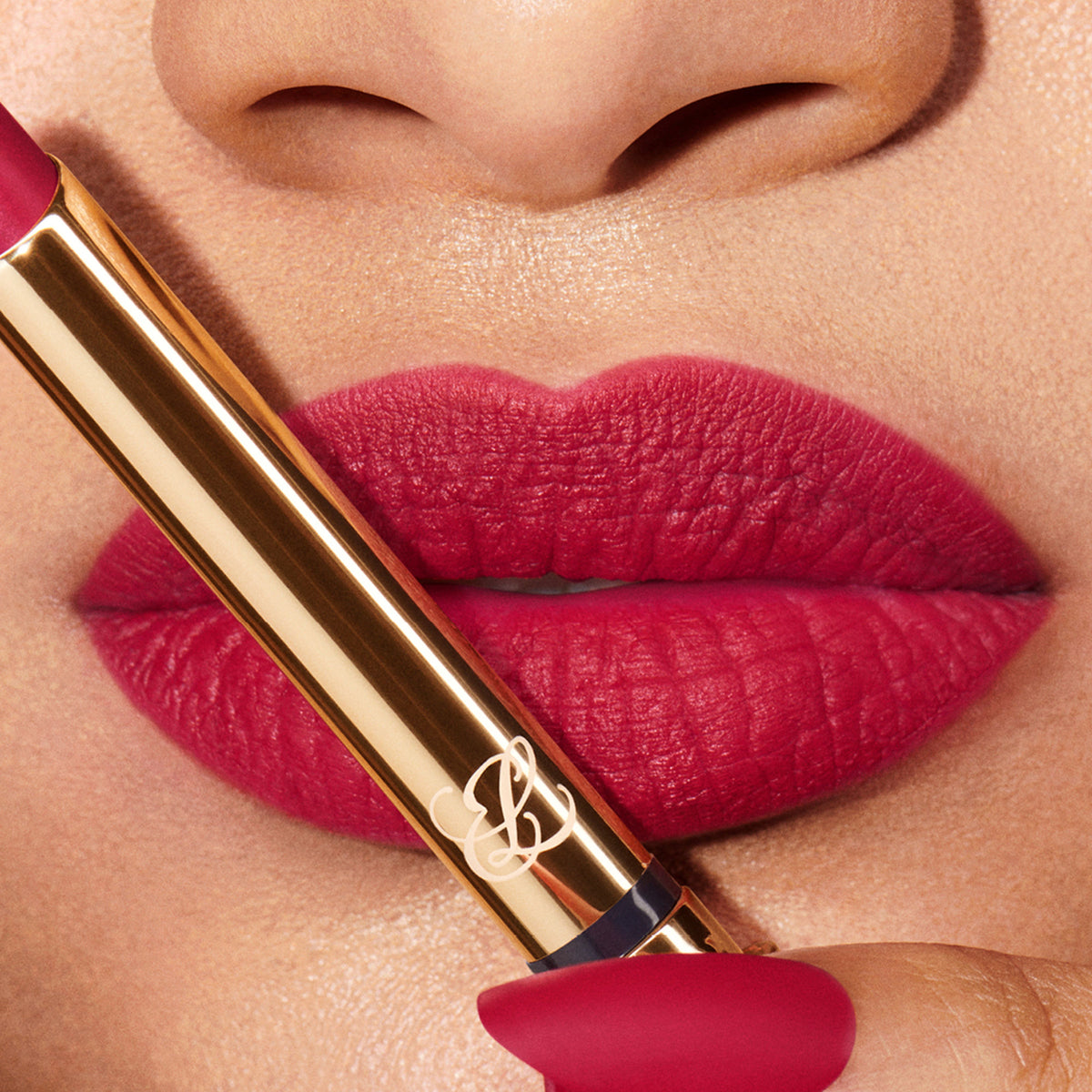 Estee Lauder Pure Color Explicit Silk Matte Lipstick in Last Impression, showing the sleek lipstick tube and shade swatch.