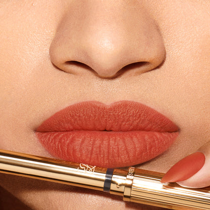Estee Lauder Pure Color Explicit Silk Matte Lipstick in Ulterior Motive, showcasing the sleek lipstick tube and rich matte finish.