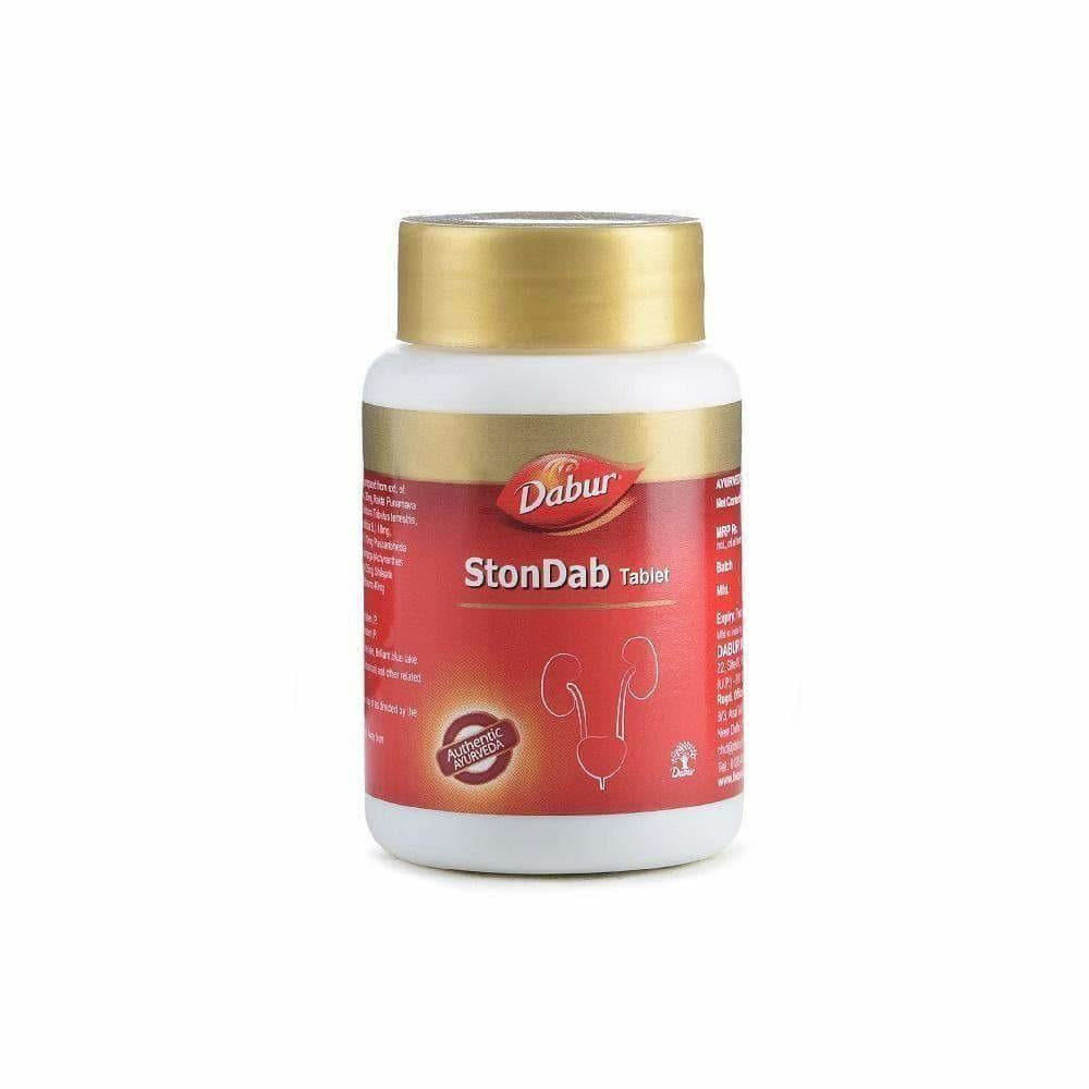 Dabur Stondab tablet showing the round, white medication tablet on a plain background.