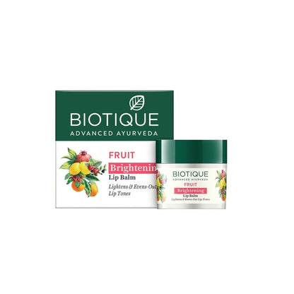 Biotique Fruit Brightening Lip Balm in a small jar with a natural, fruity label, showing the product's packaging.
