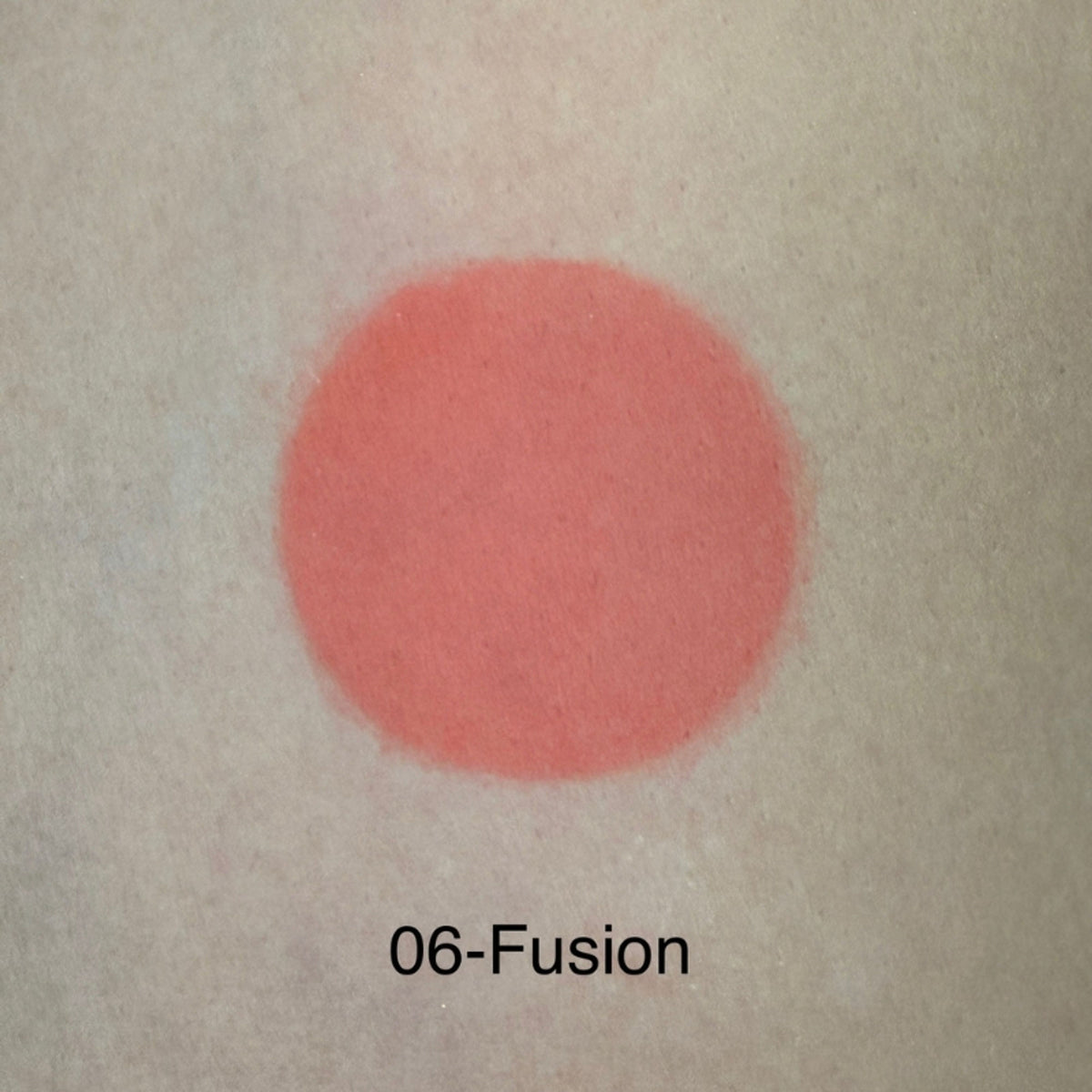 Europe Girl Cheek Dew Liquid Blush in EG-04 Coral, featuring a vibrant coral shade on a sleek bottle with applicator.