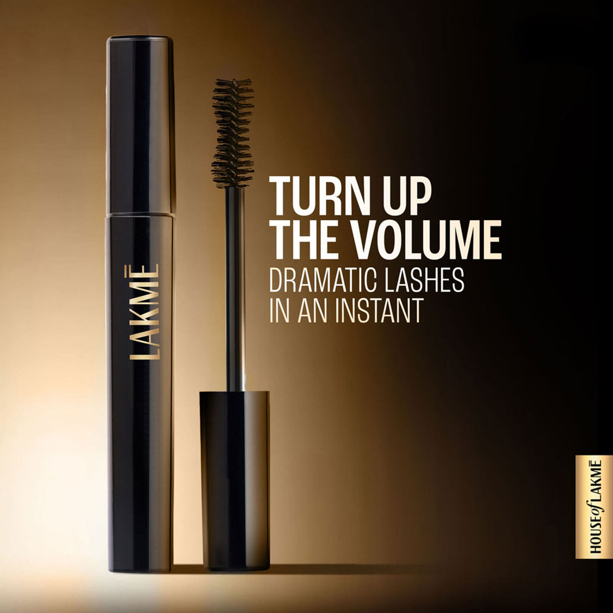 Lakme UltimateGlam Volumizing Mascara in black with a sleek tube, showing the mascara brush and product packaging.
