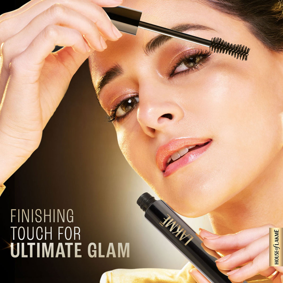 Lakme UltimateGlam Volumizing Waterproof Mascara in black with a sleek tube and brush applicator visible.