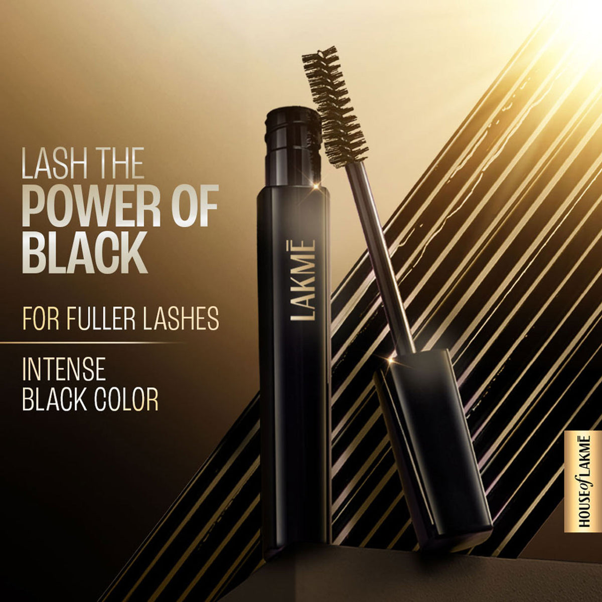 Lakme UltimateGlam Volumizing Mascara in black, showing the mascara wand and brush with the product tube.