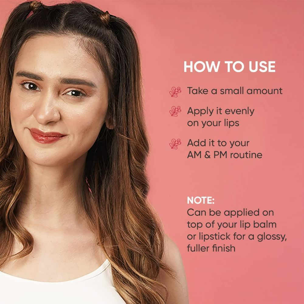 Dot & Key Lip Plumping Sleeping Mask applying on lips, hydrating and nourishing lip care product in a sleek jar.
