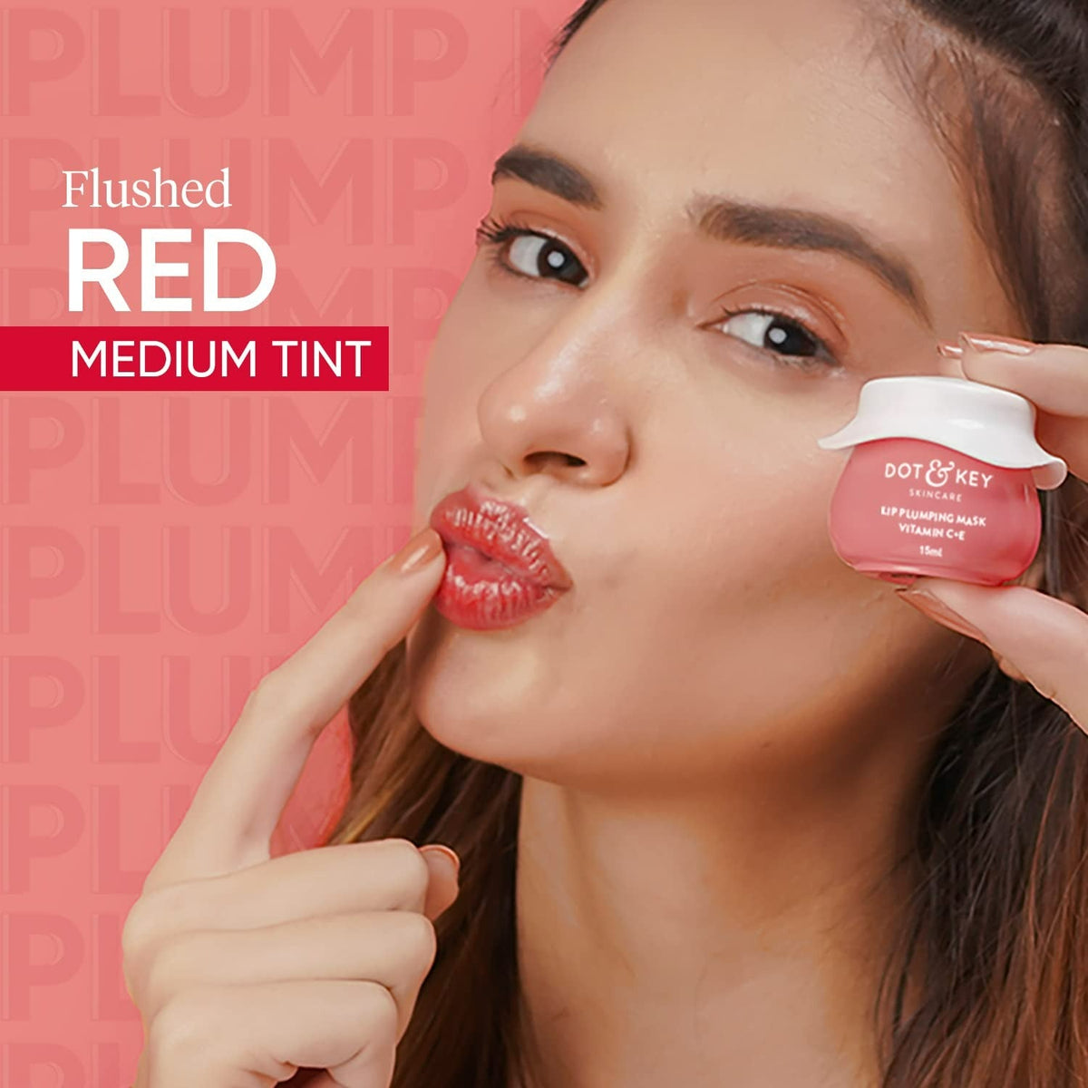 Dot & Key Lip Plumping Sleeping Mask in a jar, featuring a smooth, hydrating lip care formula with a clear, glossy finish.