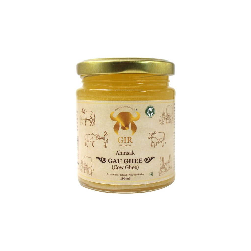 Gir Ahinsak Gau Ghee A2 Bilona from Gir Gauveda, traditional desi cow ghee in a glass jar with a golden hue.