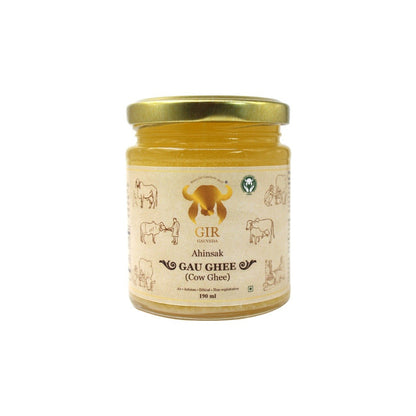 Gir Ahinsak Gau Ghee A2 Bilona from Gir Gauveda, traditional desi cow ghee in a glass jar with a golden hue.