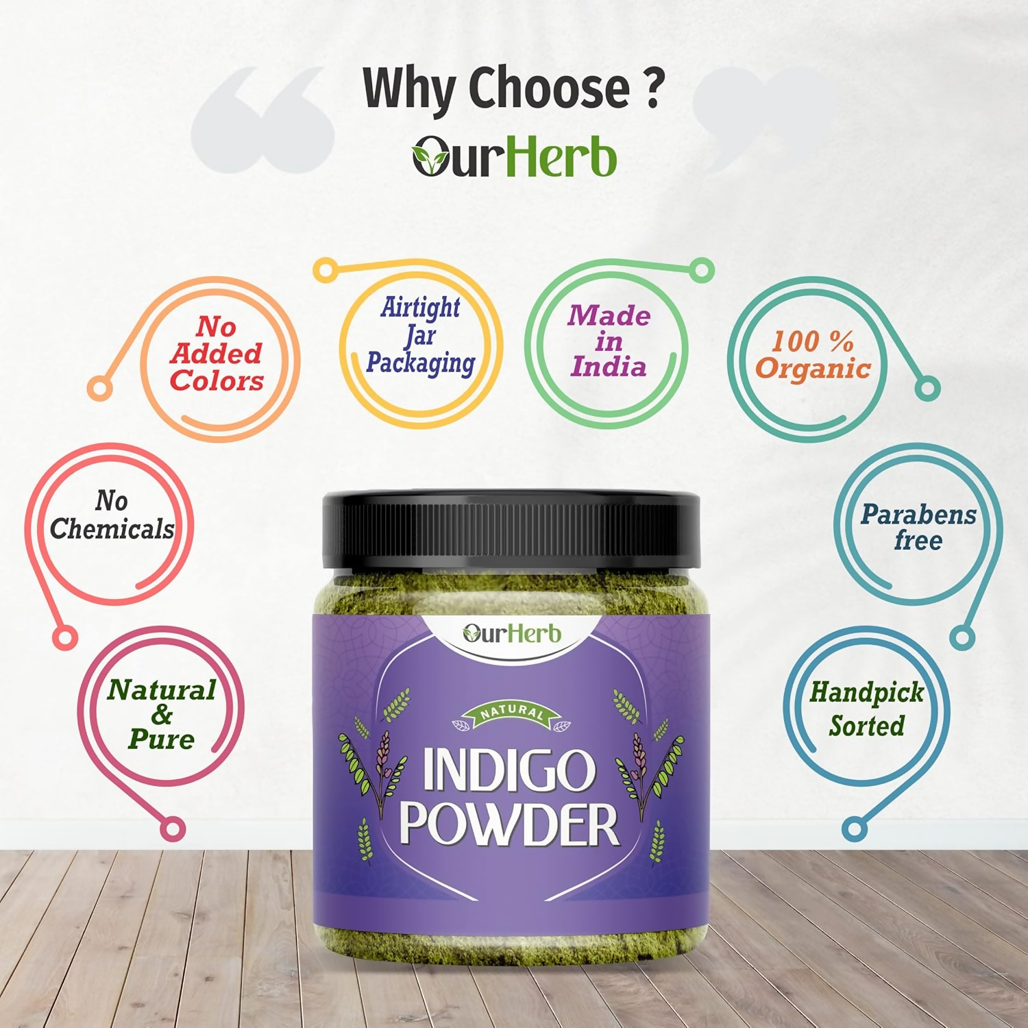 OurHerb Organic Indigo Leaves Powder for black hair color, showing vibrant green powder in a glass jar with a natural background.