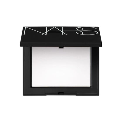 NARS Light Reflecting Setting Powder pressed mini in Crystal, showcasing the compact with translucent, shimmering powder for a luminous finish.