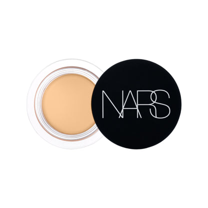 NARS Soft Matte Complete Concealer in Ginger shade, featuring a sleek tube and applicator for flawless under-eye coverage.