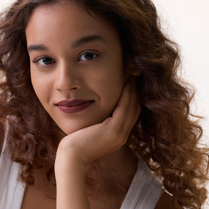 Simply Nam Satin Soft Lip Creme in Richa Ruby Brown, hydrating botanical lipstick, shown in a sleek tube with rich, warm color.