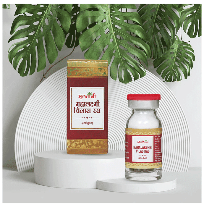 Multani Mahalaxmi Vilas Ras Ayurvedic tablets with gold, traditional herbal medicine for health and wellness.